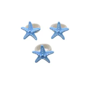 Resin starfish napkin rings set of 3, blue ocean style table decor for hotel dining.