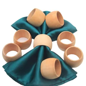 Set de servilleteros de madera, anillos portaservilletas artesanales para mesa de hotel.