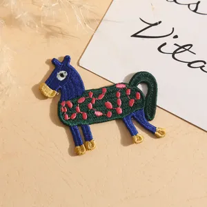 Embroidered horse patch DIY clothing accessory, cute blue and green animal patch for bags.