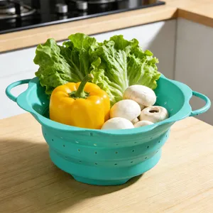 Collapsible silicone round colander in detail, perfect for draining fruits and vegetables safely.