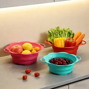 Detailed view of colorful foldable silicone colanders filled with fresh fruits and vegetables.