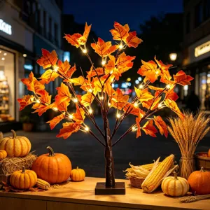 LED autumn maple tree light detail view, warm glowing leaves for party and home decor.