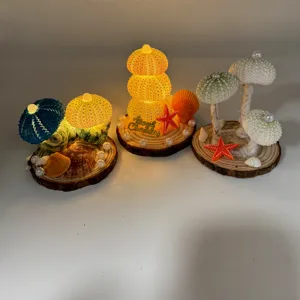 Luz nocturna hecha a mano de concha de erizo de mar decoración de escritorio DIY.