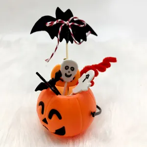 Halloween pumpkin bucket and spooky ghost bat skeleton cake topper detail decoration.