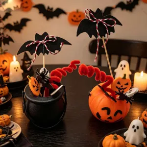 Halloween party decoration set featuring pumpkin buckets, bat picks and ghost items.