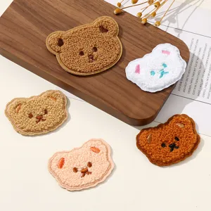 Cute fuzzy bear embroidered patches for DIY clothing, bags, and adorable children's wear.