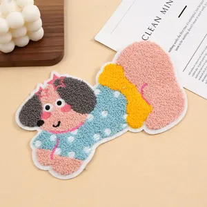 Cute cartoon puppy towel embroidery patch DIY clothing decor accessory detail view.