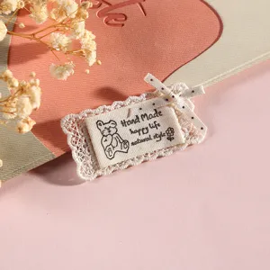 Cute Korean style lace fabric patch with embroidered bear design for DIY crafts decor.
