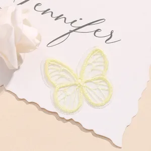 Light yellow organza butterfly embroidery patch, delicate craft for hair bows and clothes.