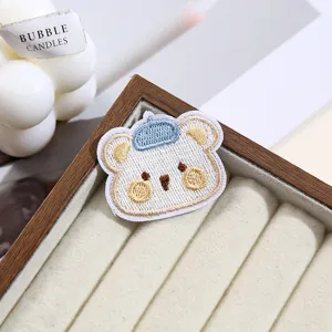 Cute cartoon bear embroidered patch, ideal for clothing DIY repair and decoration details.