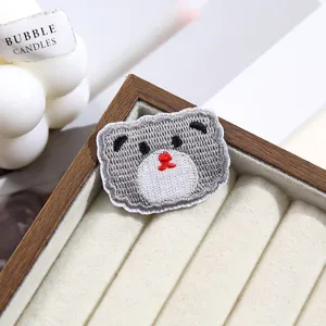 Cute grey puppy embroidered cloth patch DIY clothing repair decorative accessory detail shot