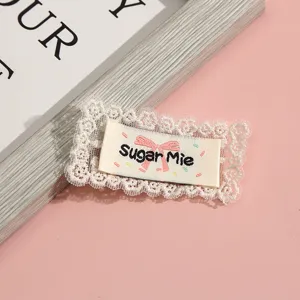 Cute lace fabric patch with sweet bow embroidery and cute text for DIY clothing decoration.