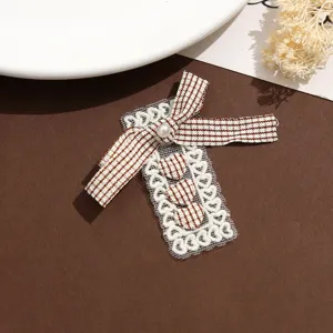Patch en tissu dentelle noeud ruban raye marron coeur accessoire vetement DIY details