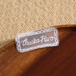 White lace embroidered patch for DIY clothing accessory and lace trim close up view