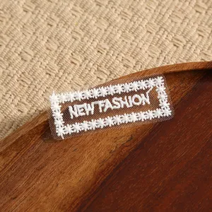 White lace embroidered patch with floral border and New Fashion text for DIY garment repair.