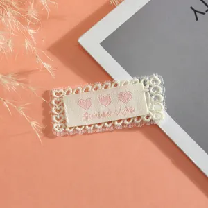 Lace fabric patch with sweet life embroidery, perfect for DIY clothing and hair accessory decor.
