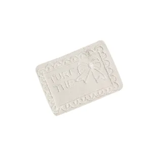 White lace embroidered patch featuring bow design clothing DIY decorative accessory