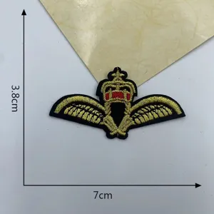 Detail view of the embroidered crown wings patch, exquisite stitching and clear dimensions.