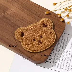 Cute brown bear embroidered patch for clothing bag DIY decoration, soft plush badge accessory.