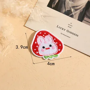 Cute strawberry bunny embroidery patch for DIY clothing repair and decoration, detailed close-up.