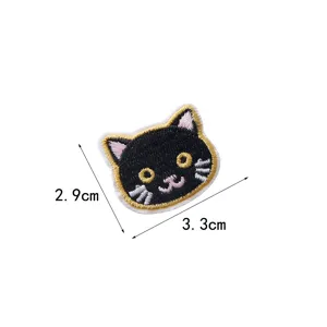 Detailed view of the cute black cat embroidered patch, showing fine stitching and size.