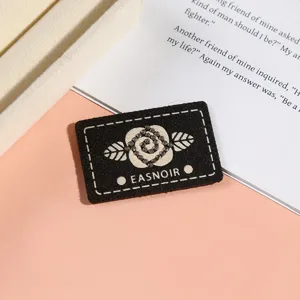 Black embroidered fabric patch with rhinestone rose motif for clothing DIY apparel accessories.