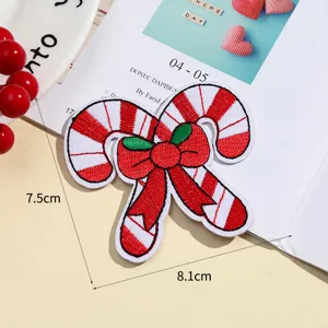 Christmas candy cane embroidery patch for DIY clothing and festive holiday garment decoration.