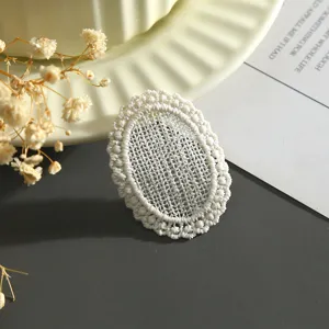 Toppa da ricamo in pizzo ovale bianco, squisito accessorio di abbigliamento fai-da-te per cucito.