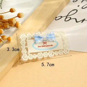 Sweet lace bow fabric patch DIY decorative apparel accessory with blue plaid bow and cute label.