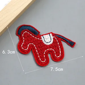 Red horse embroidery patch detail showing exquisite stitching, dimensions, and texture clearly.