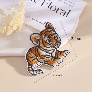 Cute cartoon tiger embroidered patch, DIY decorative clothing accessory for hats and bags.