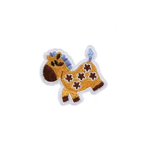 Cartoon horse embroidered patch detail shot, colorful DIY fabric applique for clothes and hats.