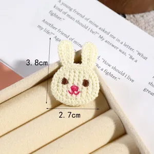Cute cartoon rabbit embroidery patch, detailed knit rabbit accessory for clothing and DIY decor.