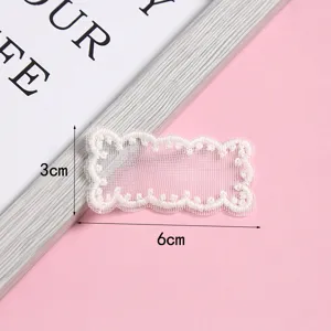 White lace embroidery patch detail shot, perfect for DIY clothing and hat decoration accessories.