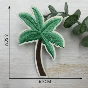 Detail view of tropical palm tree embroidered patch, perfect for DIY clothing decoration.