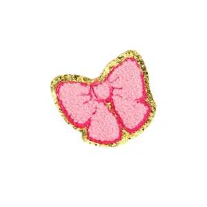 Pink bow chenille patch with gold glitter border for clothing DIY apparel accessories main image.