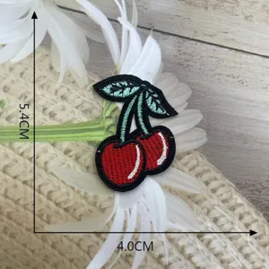 Detailed view of cute cherry embroidery patch, DIY clothing accessory size 5.4x4cm
