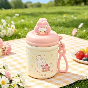 Children outdoor portable stainless steel insulated water bottle with cute cartoon rabbit lid.