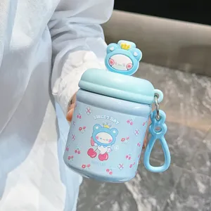 Blue cute insulated water bottle detail showing 3D bear cap and sweet day printed cup body.