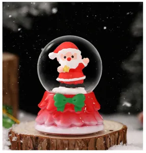 Christmas Santa Claus snow globe desktop ornament with cute design and festive snowy base detail