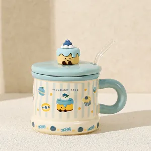 Close-up detail of the cute ceramic mug featuring a 3d blueberry cake lid and clear straw.