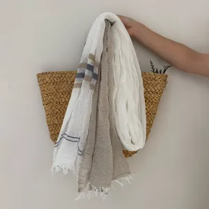 Lightweight breathable retro women scarf with chic stripe and fringe detail for daily wear.
