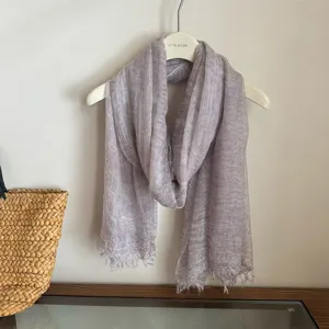 Detailed view of lightweight breathable purple scarf with fringe, soft and versatile for daily wear.