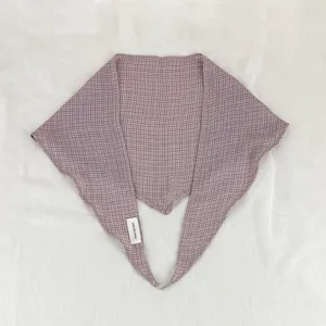 Detail shot of the cotton linen plaid diamond scarf, showing the fine fabric and cute pattern.