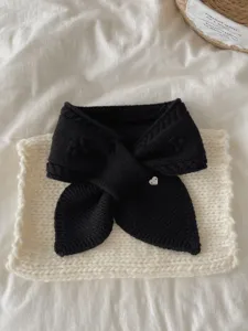 Black knitted short scarf detail, soft winter neck warmer with cute heart charm display.