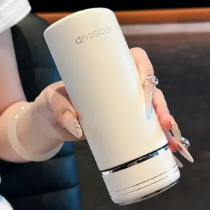 Portable mini insulated tumbler cup for women, stylish leakproof stainless steel travel mug.