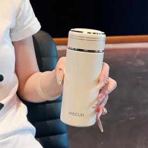 Mini portable thermos cup for women, cute insulated travel water bottle, beige style.