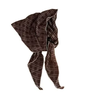 Vintage brown plaid triangular scarf with white scalloped edges, versatile retro headscarf.