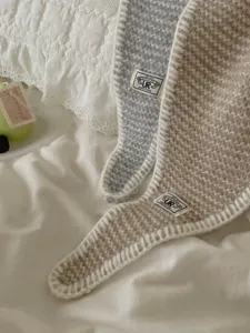 Knitted lock-stitch diamond scarf detail, cozy neck guard shawl for autumn women accessories.