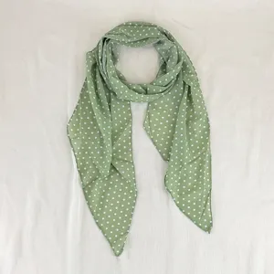 Green polka dot silk scarf detail, elegant long neck tie, summer hair band accessory.